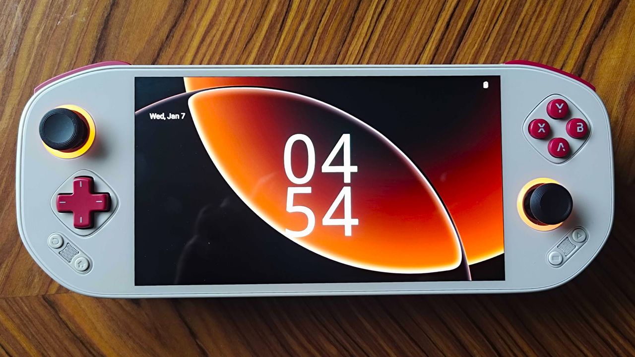 Front view of Mangmi Pocket Max with clock lock screen displayed.