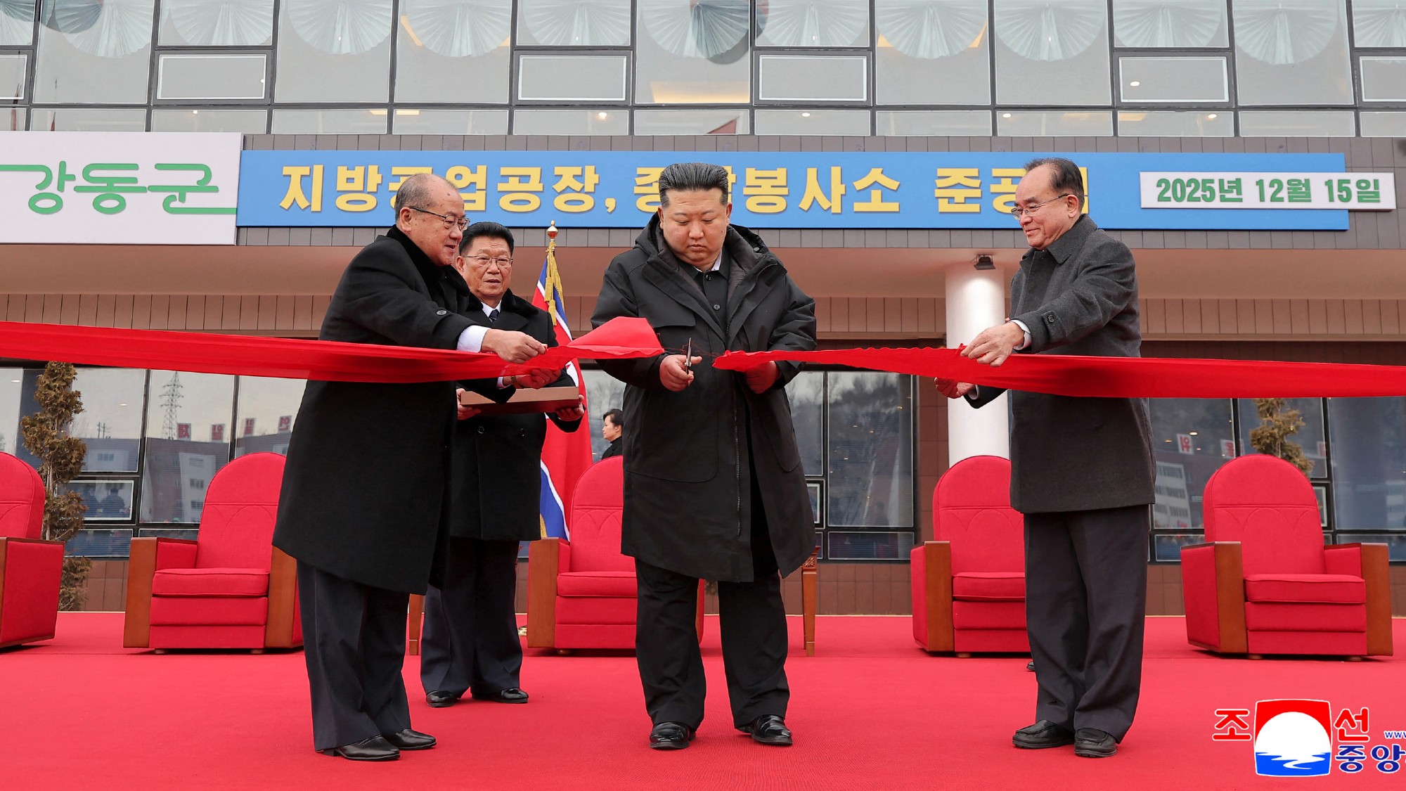 Kim Jong Un cutting the tape during the inauguration ceremony of regional-industry factories and leisure complex in Kangdong County, Pyongyang.