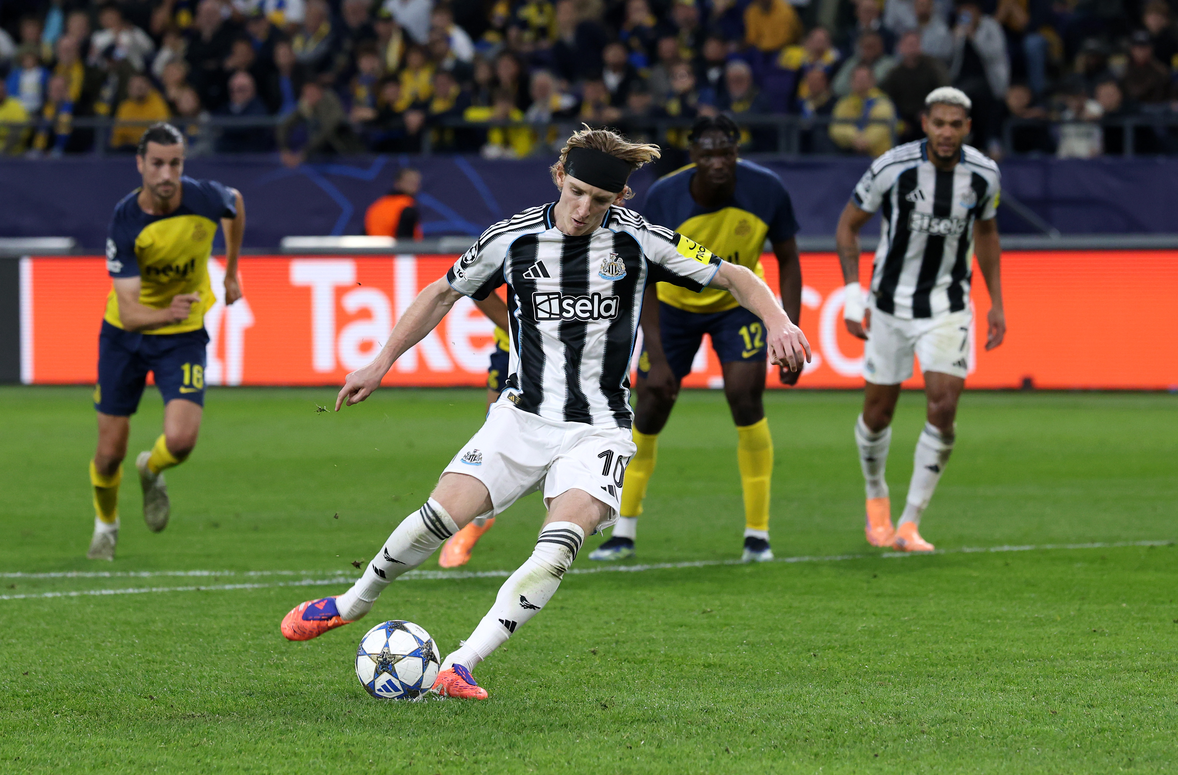 Anthony Gordon scores from the spot for Newcastle