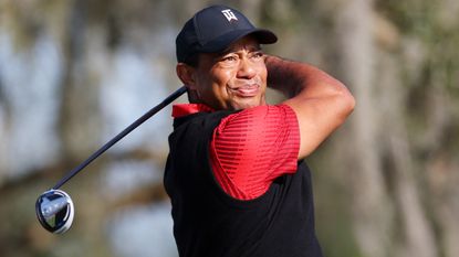 Tiger Woods takes a tee shot during the second round of the 2022 PNC Championship in Florida