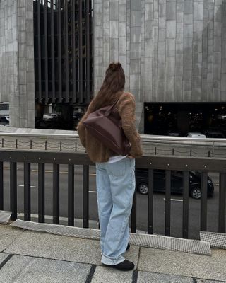 Fashion influencer  @annabelrosendahl wearing an on-trend winter outfit in Paris.