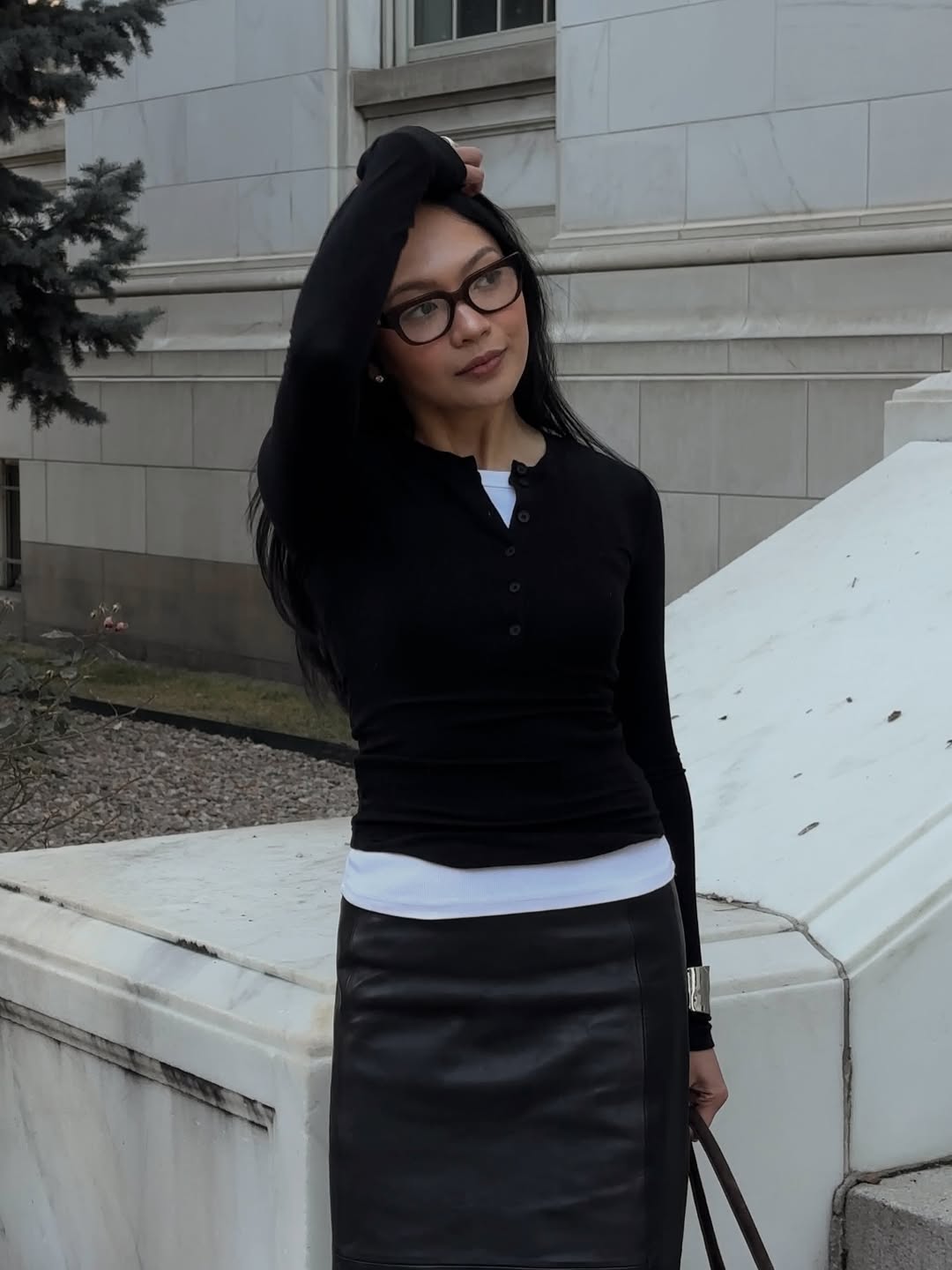 Dawn in a cropped black cardigan