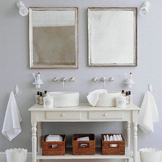 bathroom with photo frame and wash basin