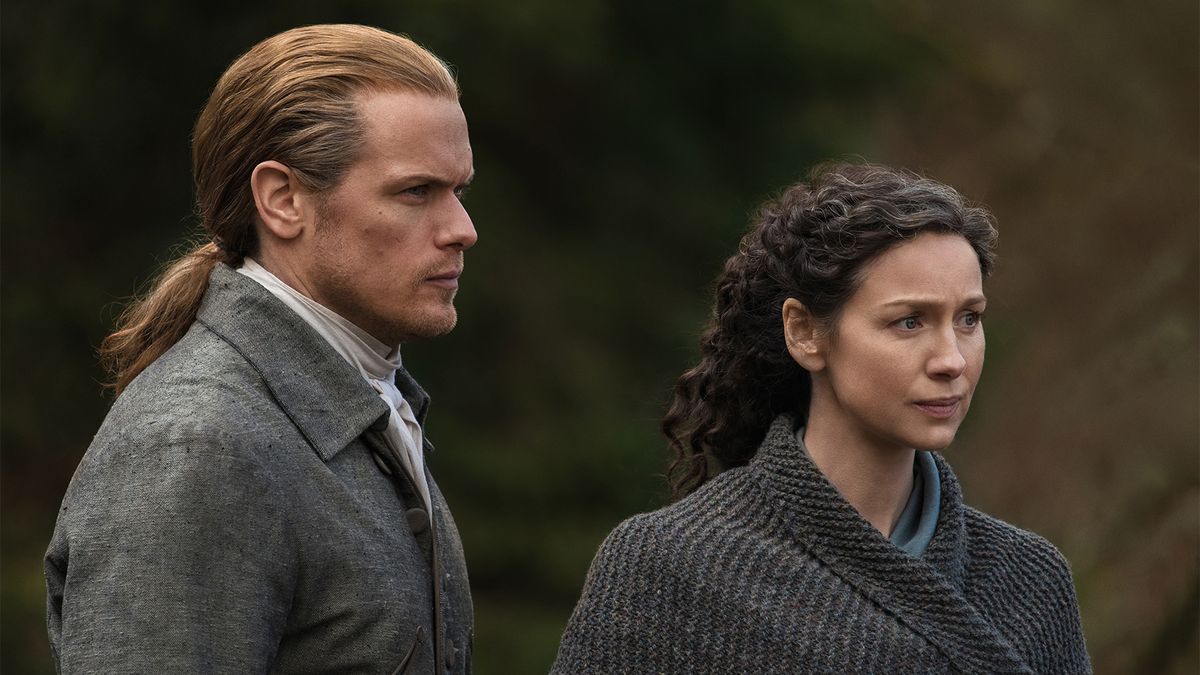 Sam Heughan as Jamie Fraser and Caitríona Balfe as Claire Randall in Starz&#039;s &#039;Outlander&#039;