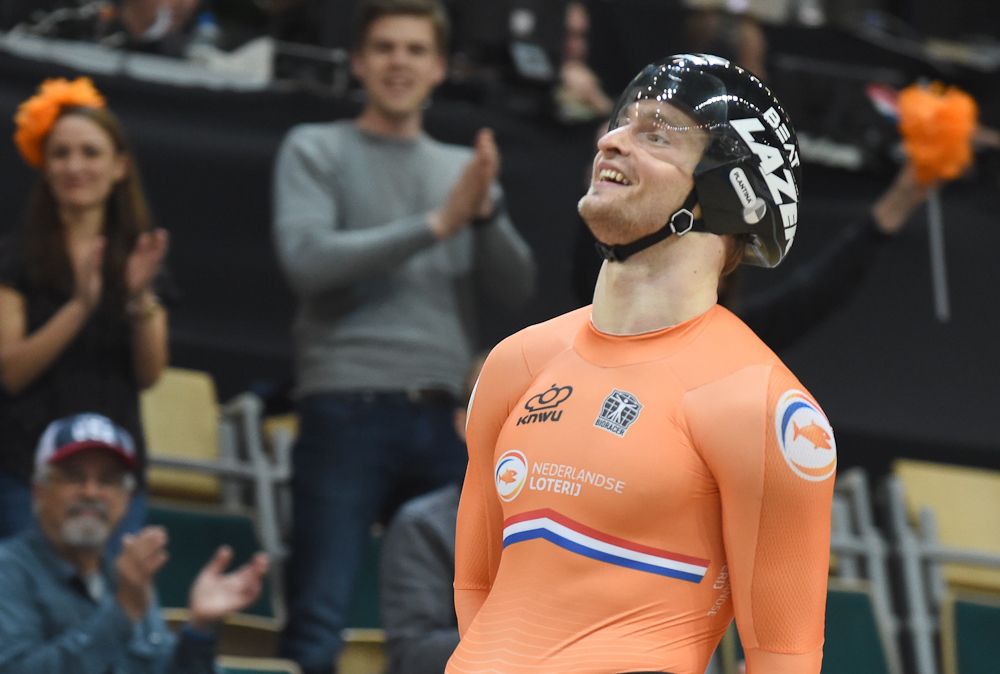 Netherland's Matthijs Buchli reacts after he won gold in the men's Keirin competition