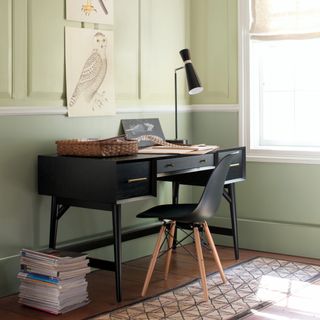 how to use the colour wheel, black modern desk and black chair in two tone green office space