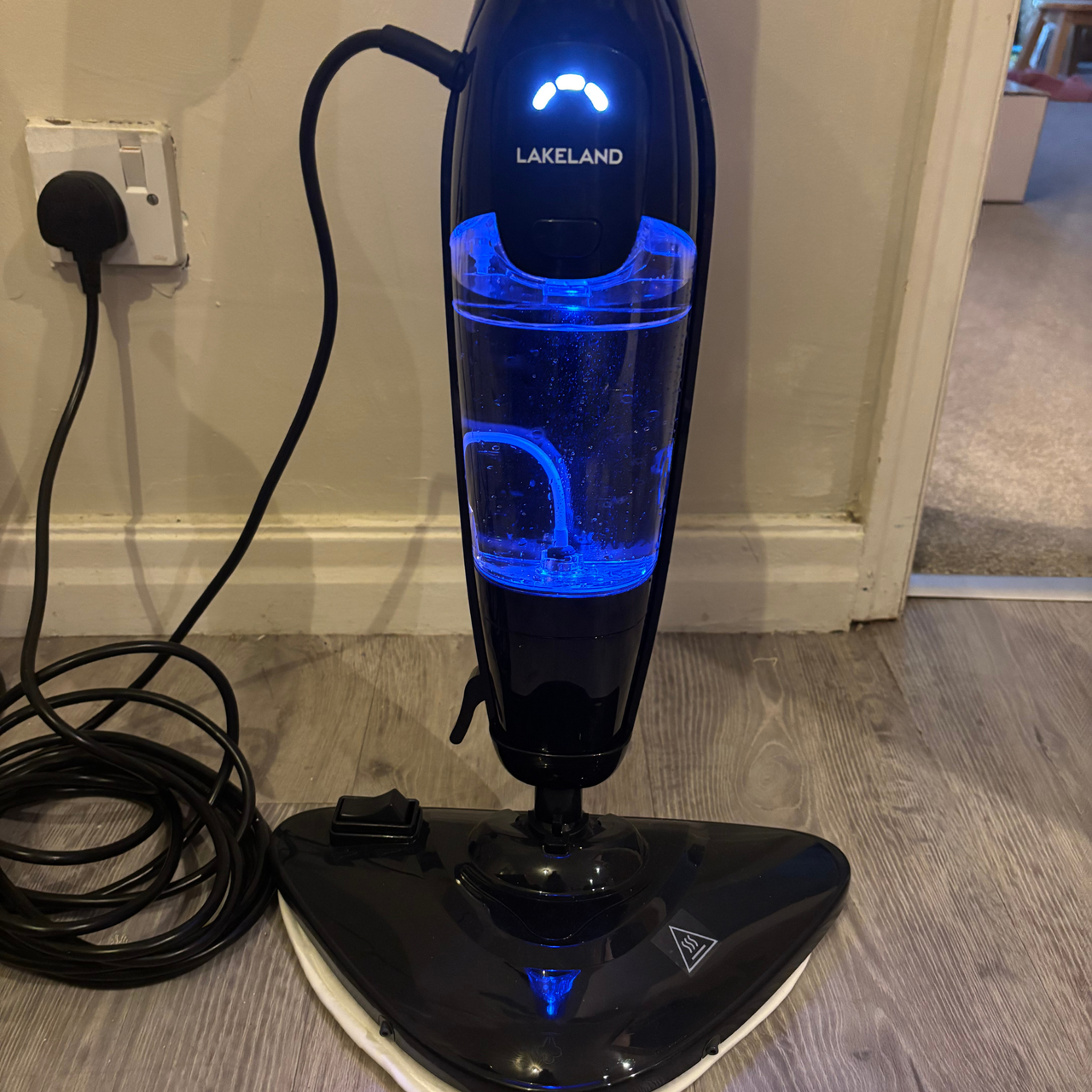 Lakeland 2-in-1 Steam Mop plugged into mains