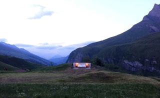 Each ‘room’ consists of a bed with a couple of nightstands and lamps, plus an incredible view