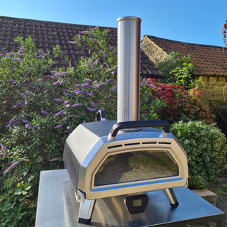 Ooni Karu 16 Multi-Fuel Pizza Oven in the garden fully assembled