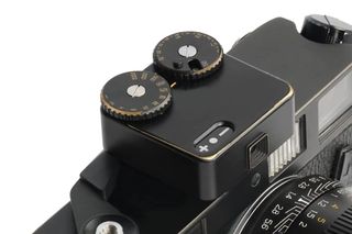 TTArtisan light meter in black brass attached to camera
