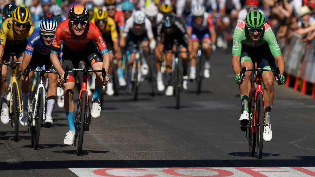 Team Treks Danish rider Mads Pedersen R crosses the finish line in first place and Team Bahrains British rider Fred Wright 3L in second place during the 19th stage of the 2022 La Vuelta cycling tour of Spain a 1383 km race from Talavera de la Reina to Talavera de la Reina on September 9 2022 Photo by Oscar DEL POZO CANAS AFP Photo by OSCAR DEL POZO CANASAFP via Getty Images