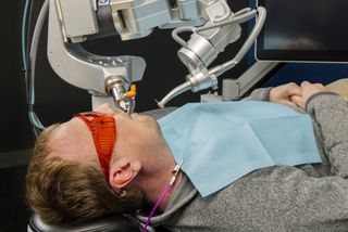 An image of Perceptive's dental robotic system, capable of performing fully-automated dental procedures.