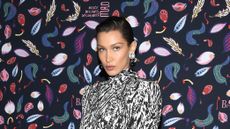 bella hadid in black and white dress at fashion event