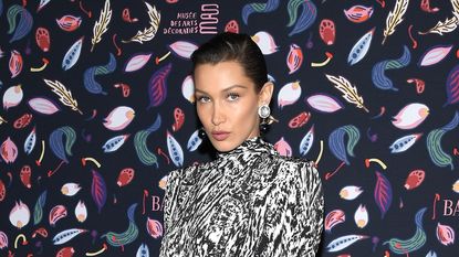 bella hadid in black and white dress at fashion event