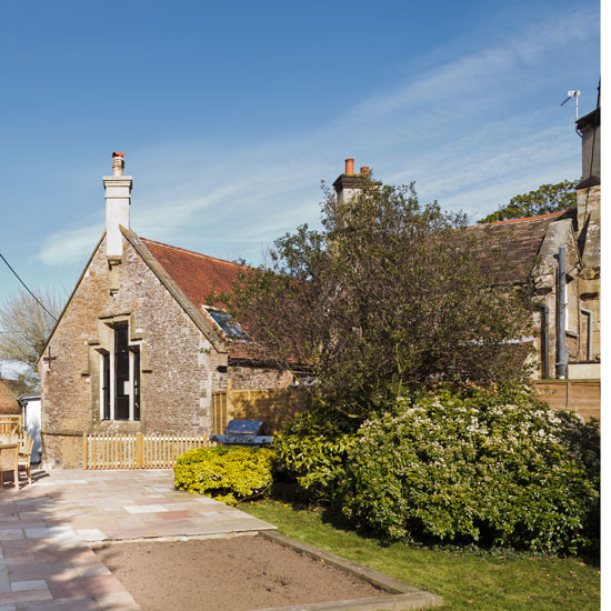 exterior with school house and plants
