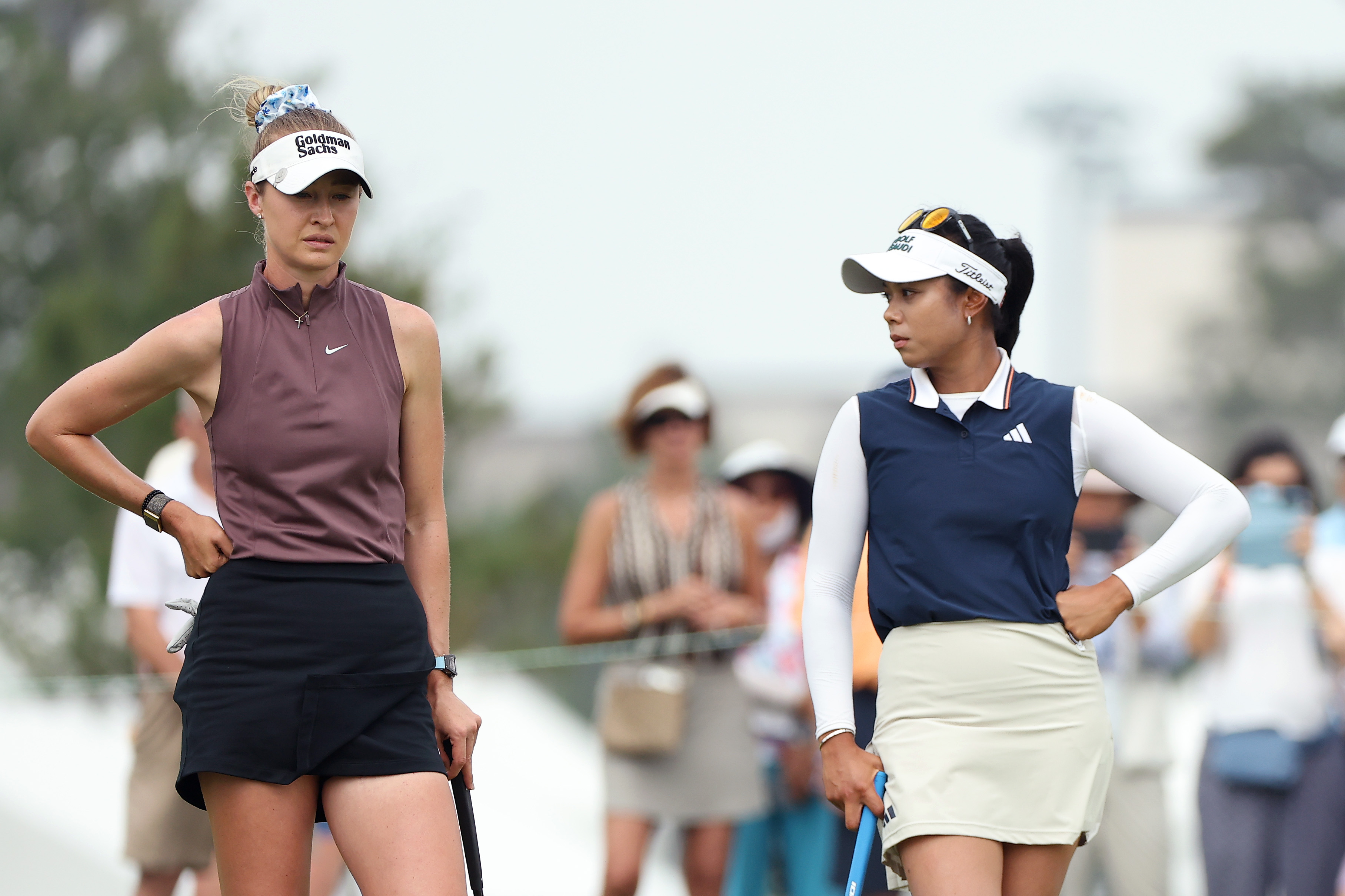 Nelly Korda and Patty Tavatanakit look on from the 16th green during the final round of The Chevron Championship