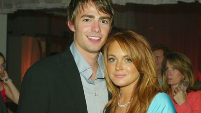 Cast members Jonathan Bennett and Lindsay Lohan pose at the after-party for Paramount's "Mean Girls" at the Cinerama Dome Theater on April 19, 2004 in Los Angeles, California