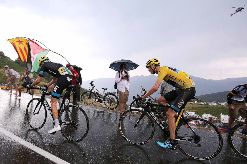 Chris Froome follows Geraint Thomas during stage 12.