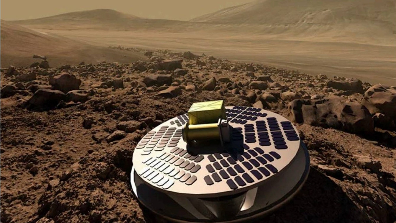 illustration of a disk-shaped lander on a rocky desert surface