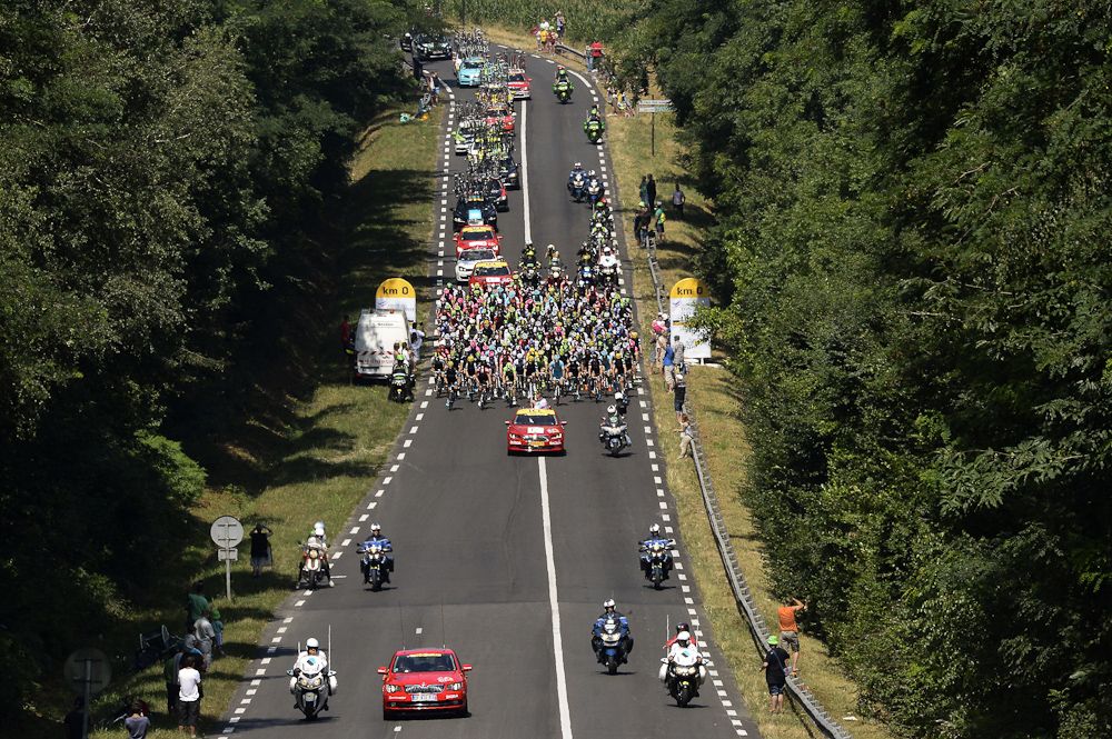 The peloton makes its way during stage 11 of the Tour de France.