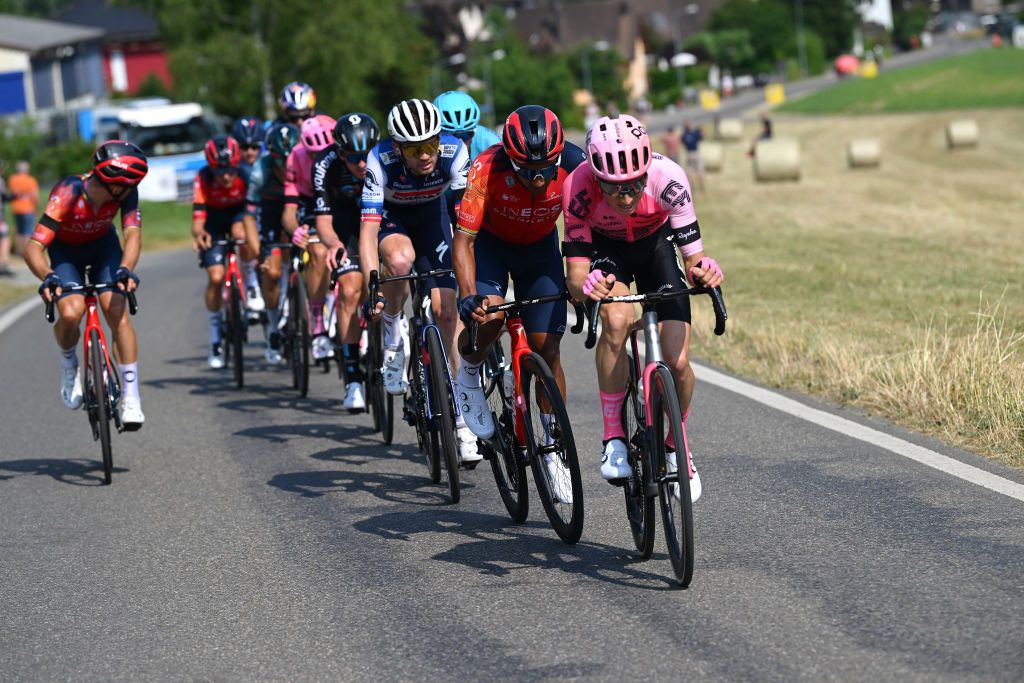 WEINFELDEN SWITZERLAND JUNE 17 LR Kasper Asgreen of Denmark and Team Soudal QuickStep Jhonnatan Narvaez of Ecuador and Team INEOS Grenadiers and Neilson Powless of The United States and Team EF EducationEasyPost compete during the 86th Tour de Suisse 2023 Stage 7 a 1835km stage from Tbach to Weinfelden UCIWT on June 17 2023 in Weinfelden Switzerland Photo by Dario BelingheriGetty Images