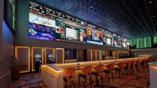 A Planar 129-foot-long continuous LED display brings action to sports bettors. 