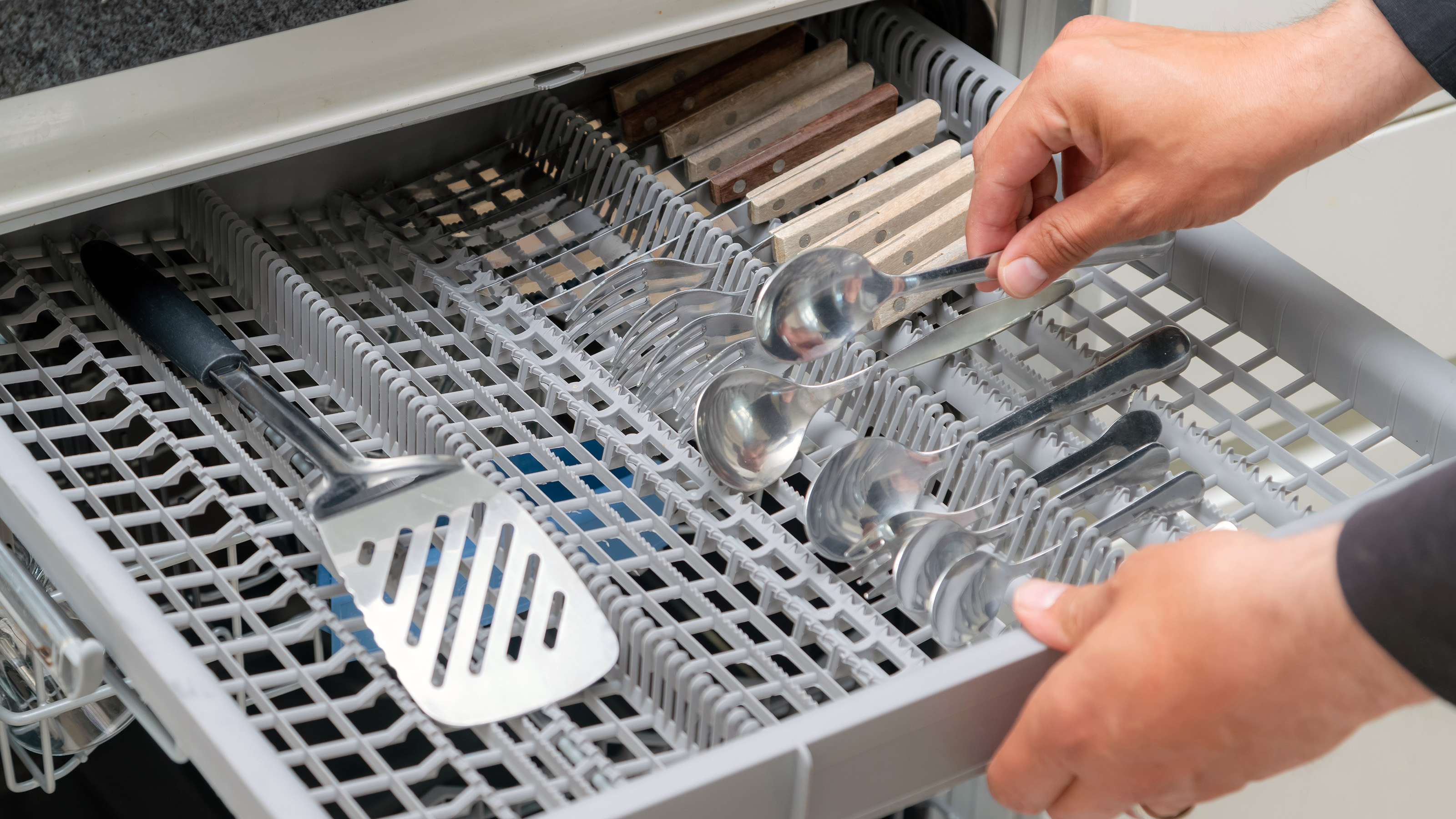 Loading silverware in the dishwasher