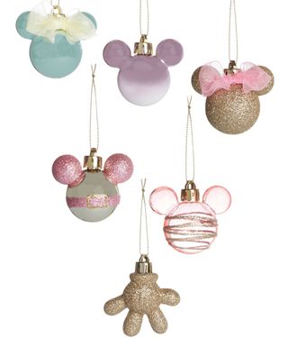 disney pastels and gold baubles on wall