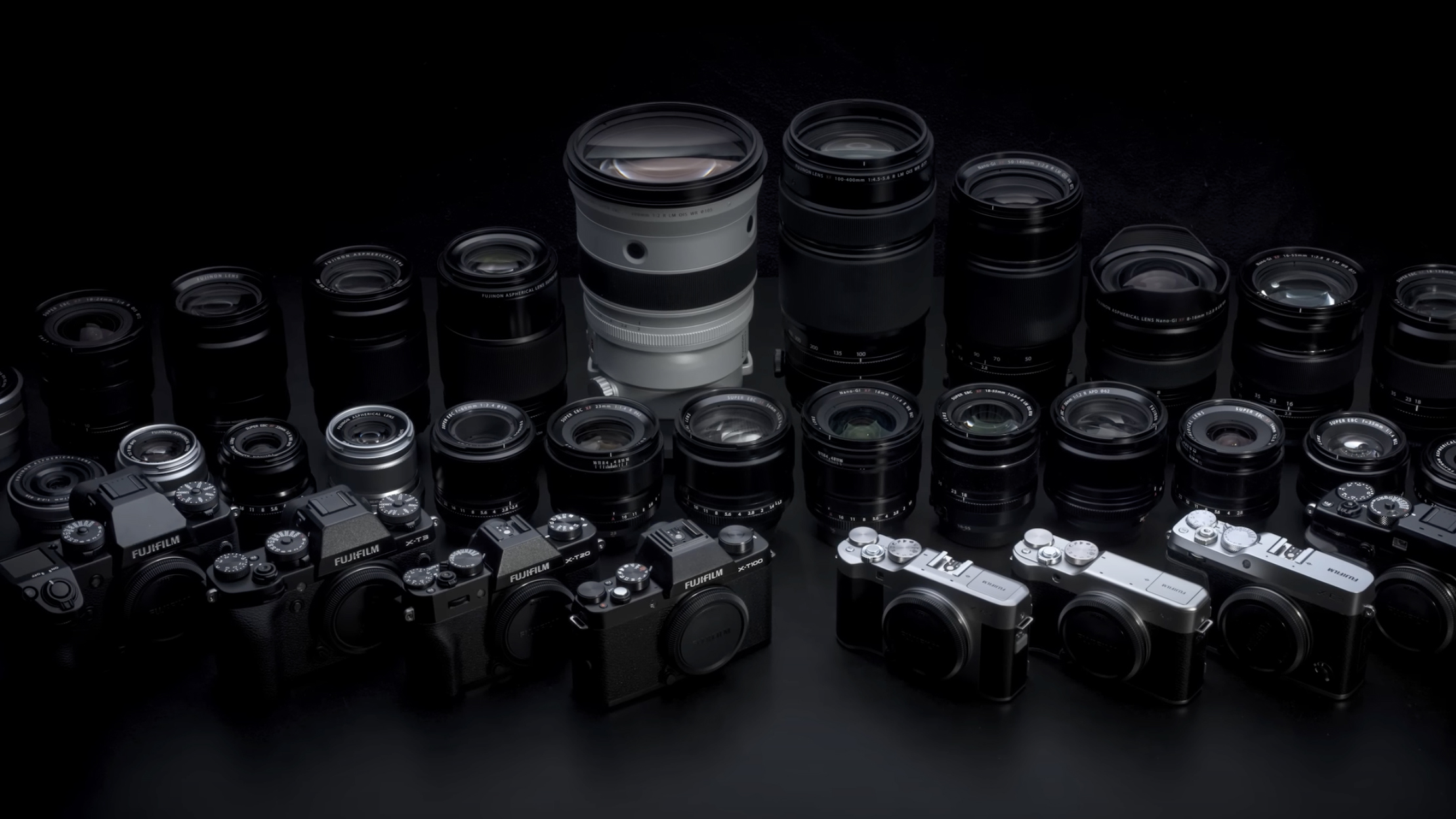 A group of Fujifilm cameras and lenses