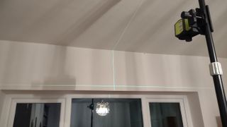 using a laser level to fit a roman blind