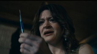 Ashley looks reluctantly at a syringe of Compound V in The Boys season 4 finale