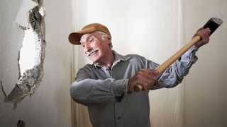 Man using sledgehammer 