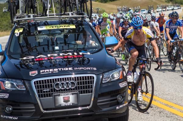 Christian Vande Velde (Garmin-Sharp) goes to the team car for water.