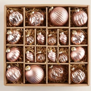 box of pink glass baubles