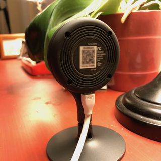 Nest Cam's back: awkward vertical plug, itty-bitty QR code.