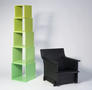 stacked green storage and black chair