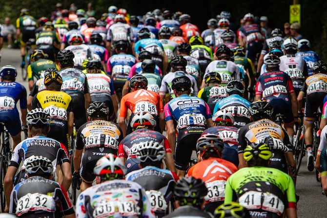 The peloton hits the base of the climb during the US Pro Road Race National Championships on June 24, 2018 in Knoxville, Tennessee