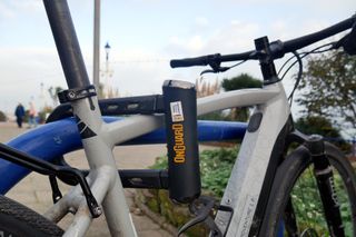 the onguard rocksoild shown locking a electric bike at a bike rack