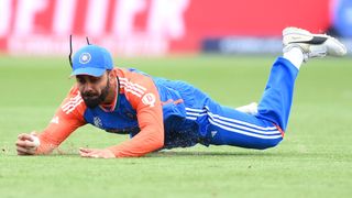 Virat Kohli fields a ball in India's victory against USA ahead of the India vs Canada live stream in the T20 World Cup.