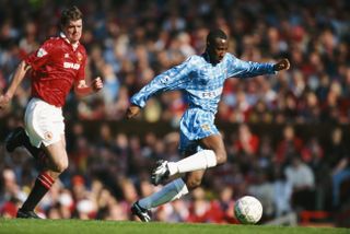 Peter Ndlovu on the ball for Coventry City against Manchester United in May 1994.