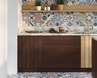 mixed Moroccan style patterned tiles in a kitchen with dark wood cabinets, marble countertops and open shelving