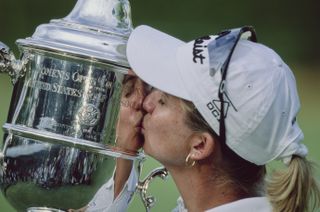 Karrie Webb lifts the trophy