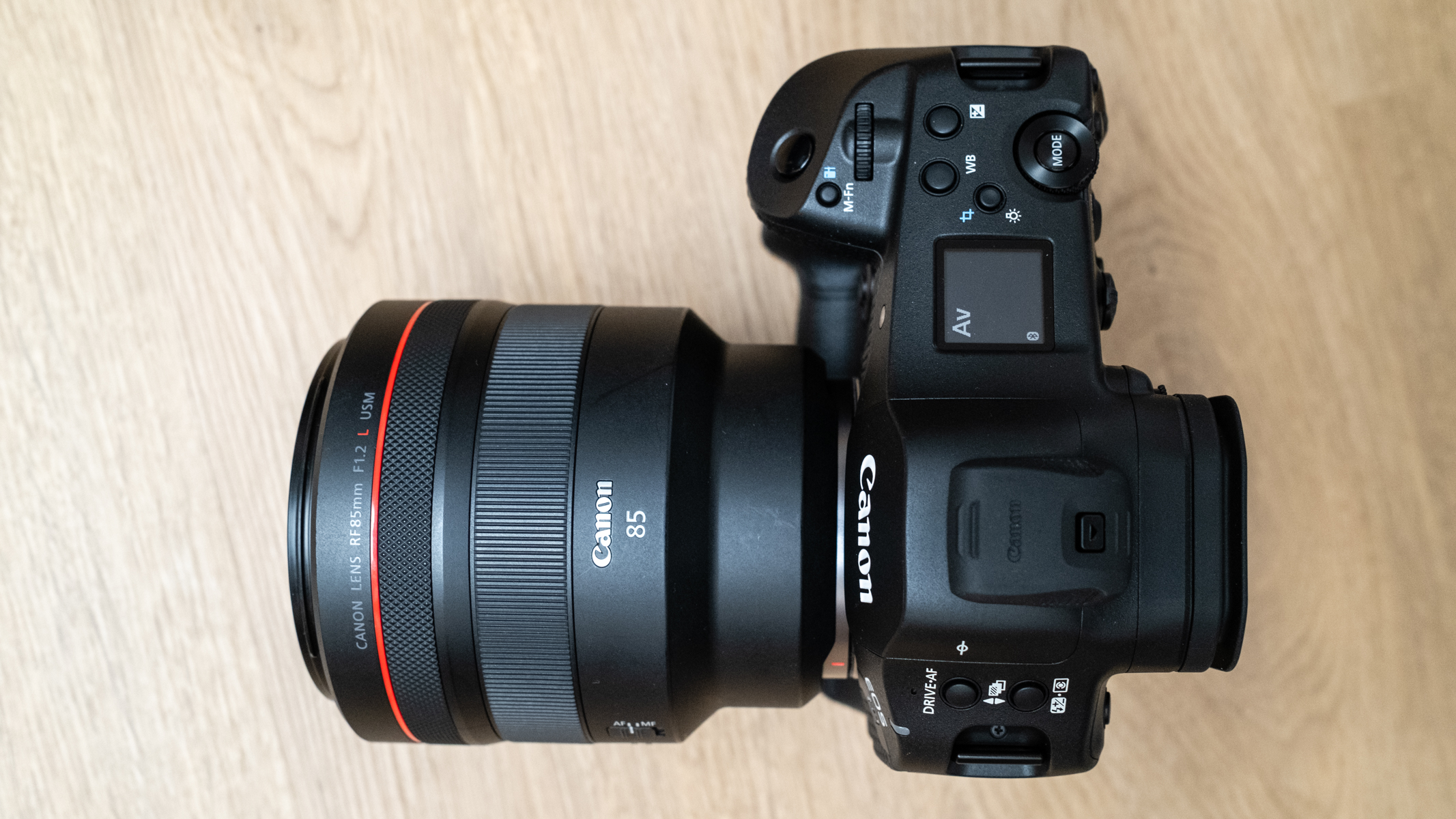 Canon RF 85mm f/1.2L USM attached to a Canon EOS R1 viewed from above