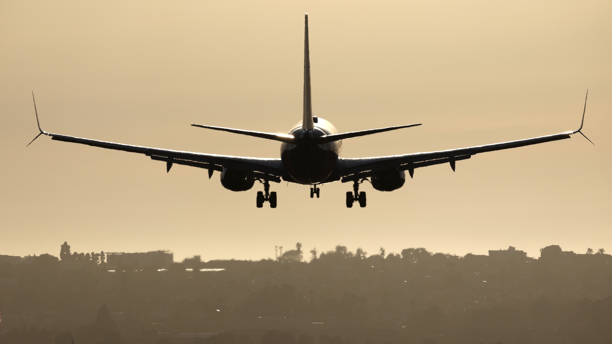 An Alaska Airlines Boeing 737 MAX 9 airplane approaches San Diego International Airport for a landing on May 10, 2025 in San Diego, California.