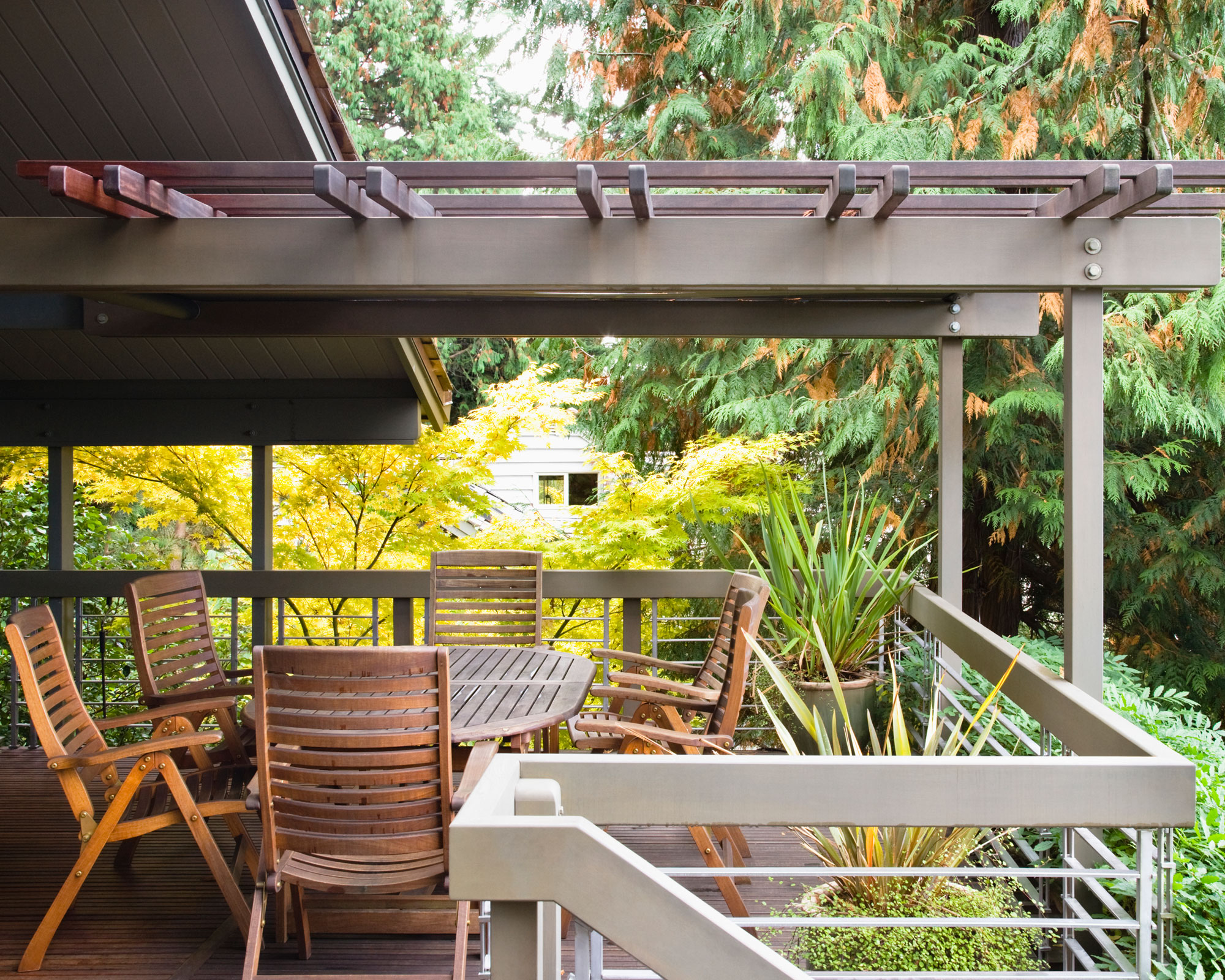 balcony with pergola and garden furniture