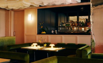 The Cockatoo by Bistrotheque boasts a moody atmosphere with green velvet sofas and shiny walls