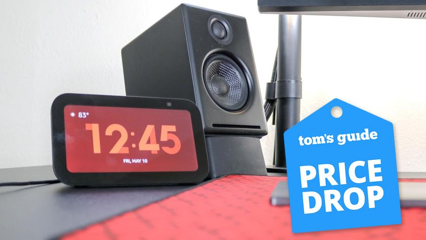 The Echo Show 5 (3rd Gen) on a desk with a Tom&#039;s Guide Price Drop deals badge