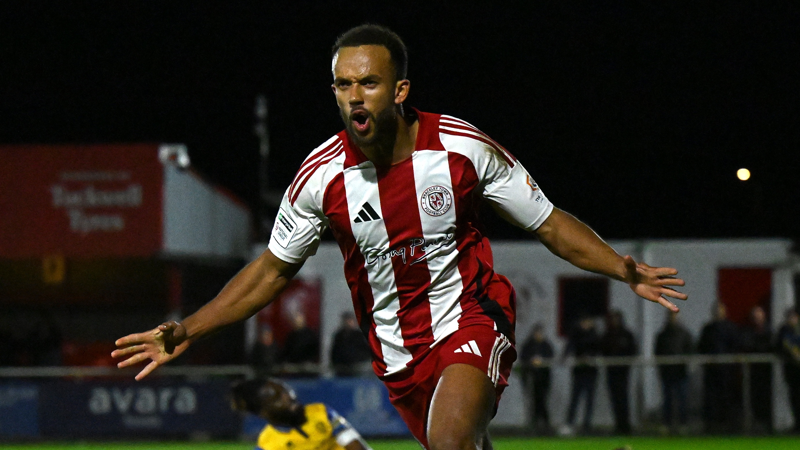 Danny Waldron of Brackley Town celebrates after scoring during the Emirates FA Cup Fourth Qualifying Round Replay match between Brackley Town and Woking on October 14, 2025 in Brackley, England.