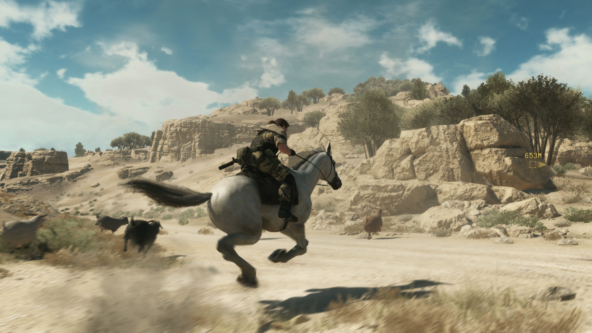 Metal Gear Solid 5 - Snake rides a horse through a rocky open desert