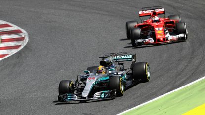 Lewis Hamilton leads Sebastian Vettel at the Spanish Grand Prix